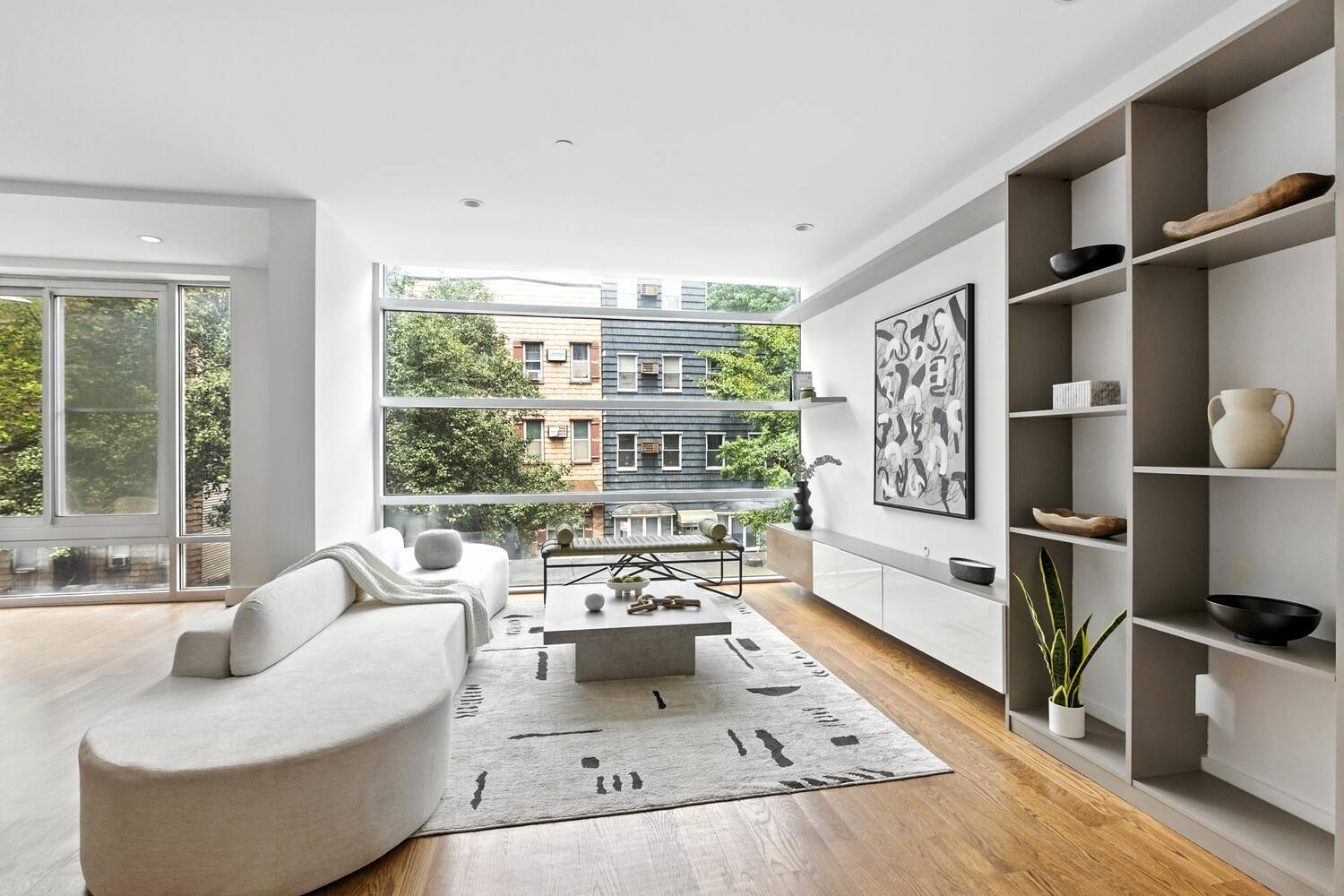 This Williamsburg condo has everything you're looking for private outdoor space, a keyed elevator, floor to ceiling windows, and plenty of storage.