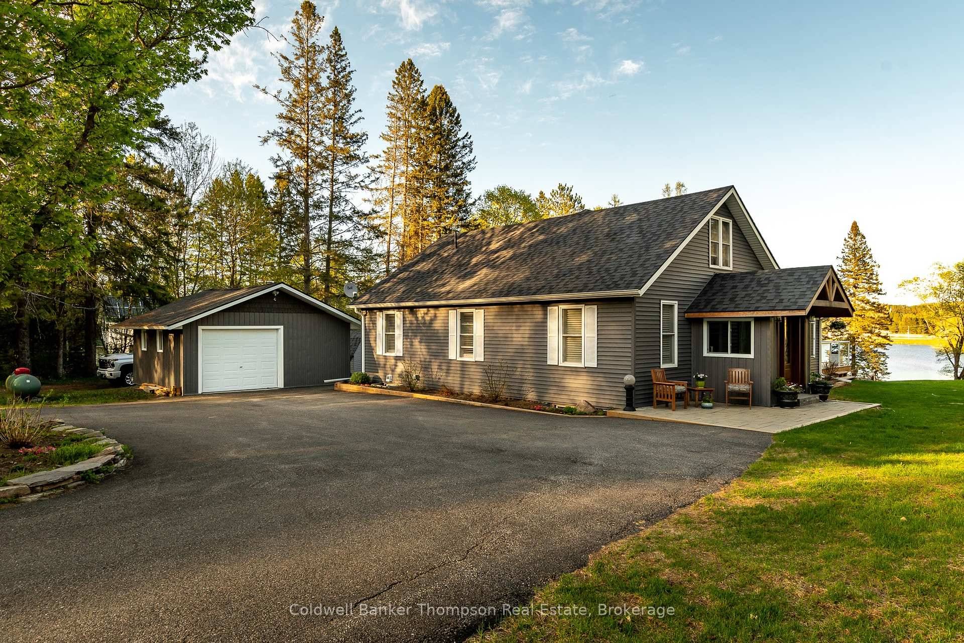 Fall in love with this stunning 4 bed, 2 bath home or cottage on the shores of Perry Lake in beautiful Kearney.