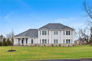 BETTER THAN NEW built in 2021 LANDMARK estate property with OVER 7000 TOTAL SQUARE FEET of luxurious living space located at end of private cul de sac neighborhood in highly ...