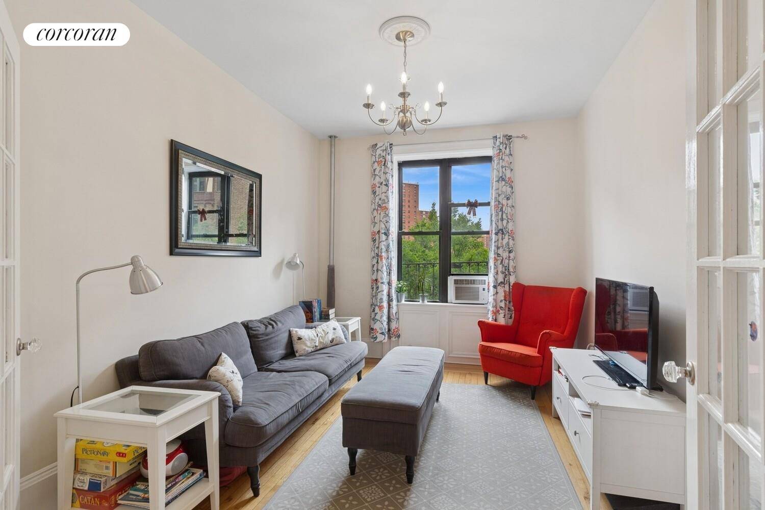 Move right in. Renovated, sunny corner apartment has windows in every room, open city and tree top views, plus east, south and west exposures providing light all day.