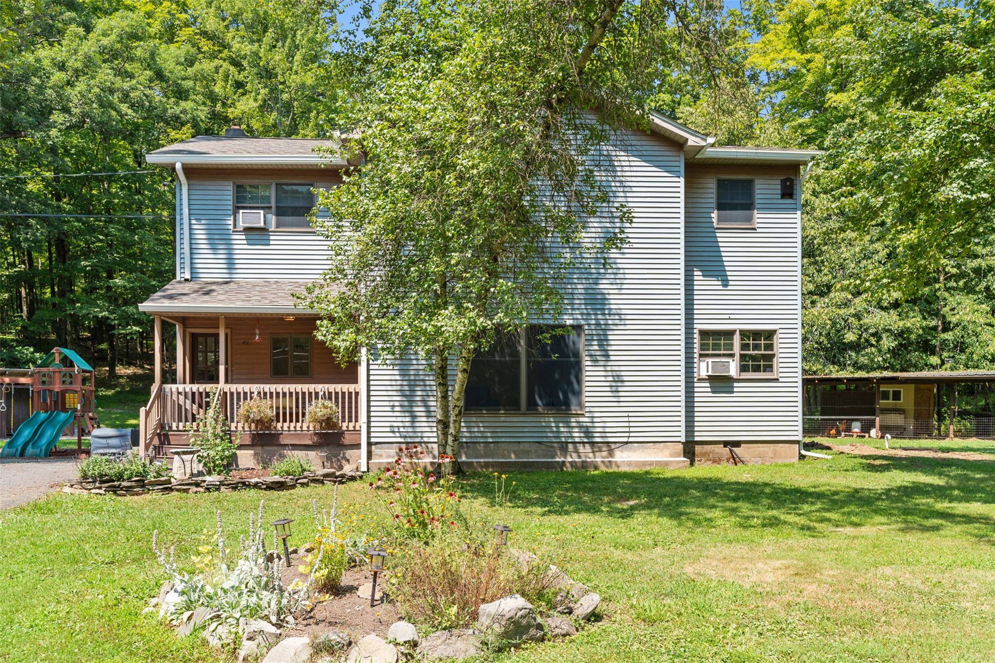 Located just minutes from the vibrant villages of Woodstock and Kingston and surrounded by some of the best hiking in the Hudson Valley, this spacious Colonial offers incredible potential.