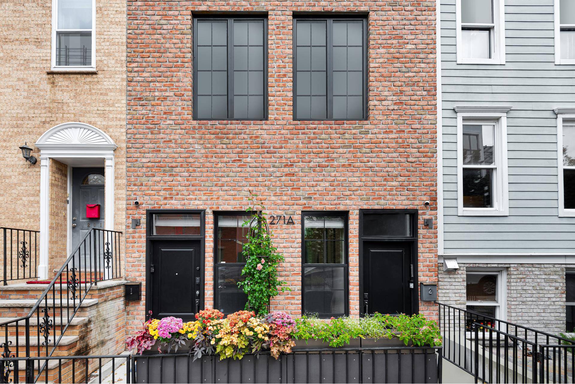Charm meets luxury at 271A 22nd Street in picturesque Greenwood.