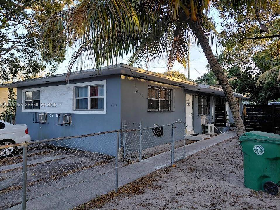 Modern 4 Bedroom 2 Bathroom Duplex with ample parking and private fenced backyards in the heart of highly sought after Miami, just 1 mile from the Design District.