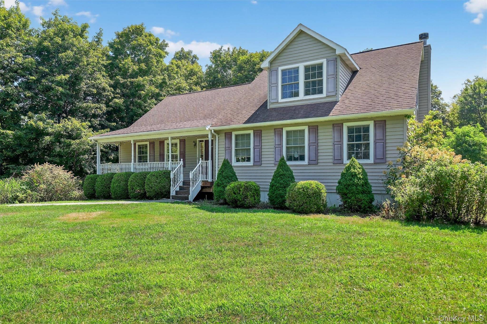 Welcome to your dream Hudson Valley retreat, a beautifully updated raised ranch set on 2.
