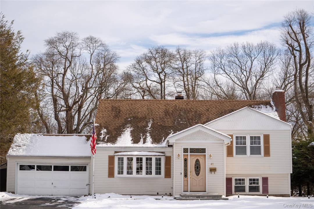 Located on one of Valhalla's most sought after streets and boasting a huge, level piece of property, this split level home is ready for it's new owners.