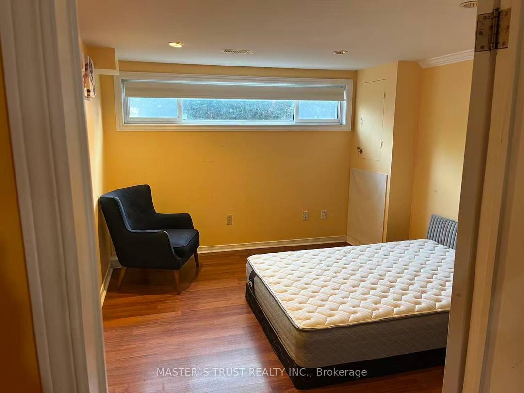 Bright and spacious raised basement apartment with large above grade windows and private separate entrance from backyard.