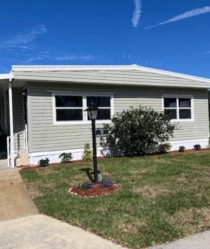 Welcome to your dream home in Pinelake Village, a 55 manufactured housing community in Jensen Beach, Florida.
