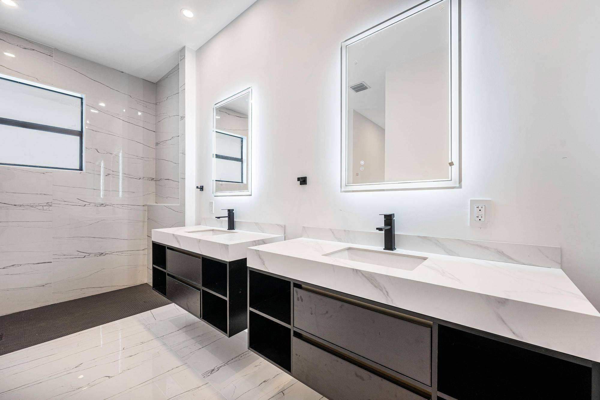 Experience luxury living in this exceptional, brand new custom home nestled in one of Port St.