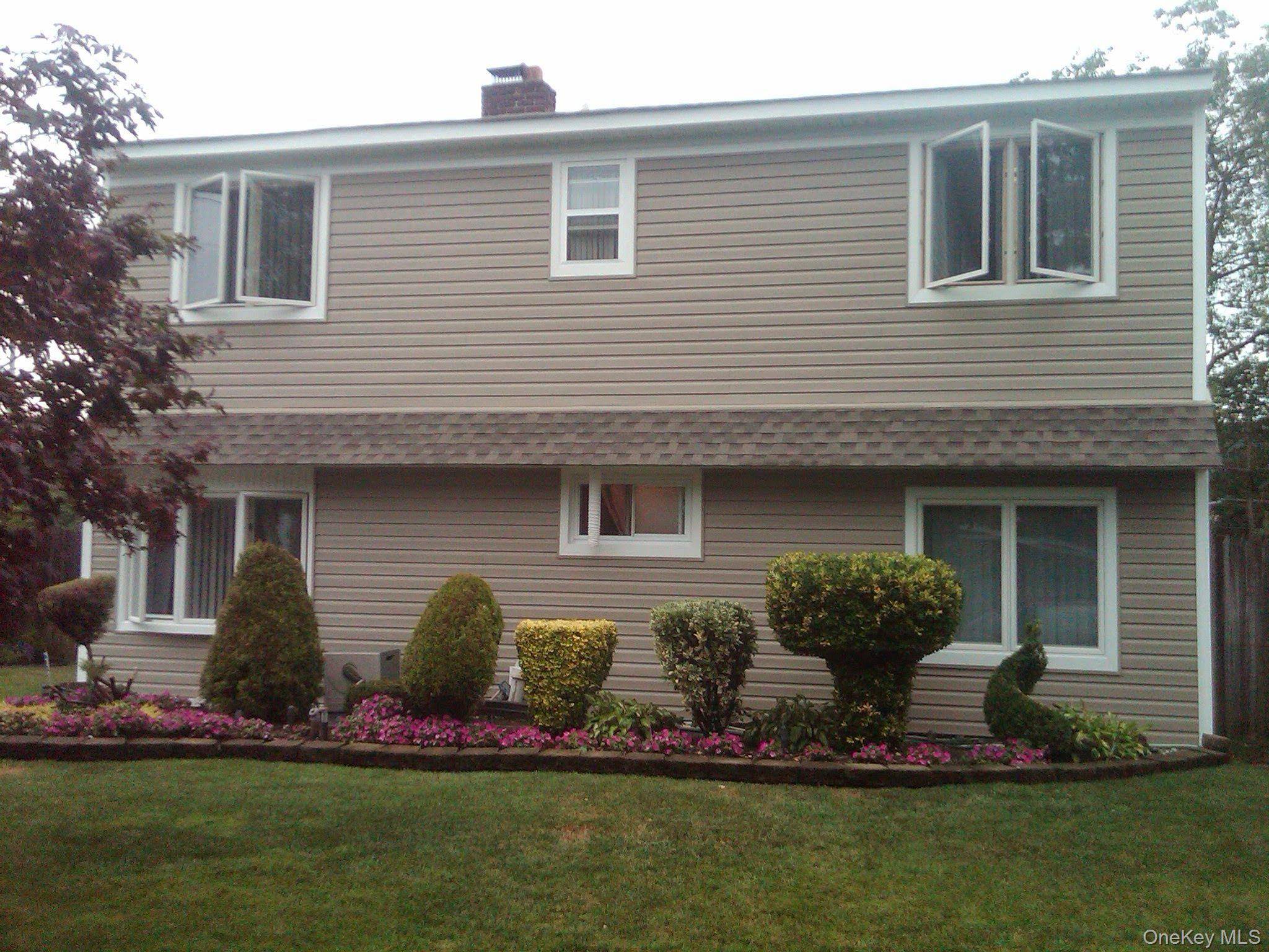 Welcome to this spacious and charming Cape Cod style home located in the heart of Levittown.