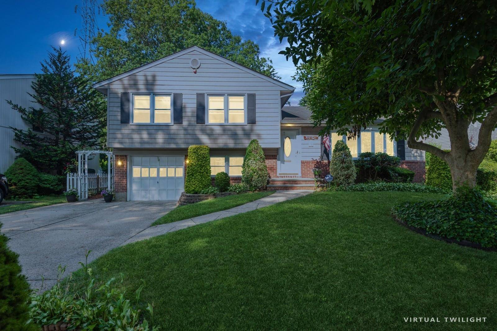 Nestled on an impeccably groomed 60 x 125 lot, with an additional 60 x 25 adjoining parcel, this lovely 3 bedroom split level residence exudes timeless elegance and boundless potential.