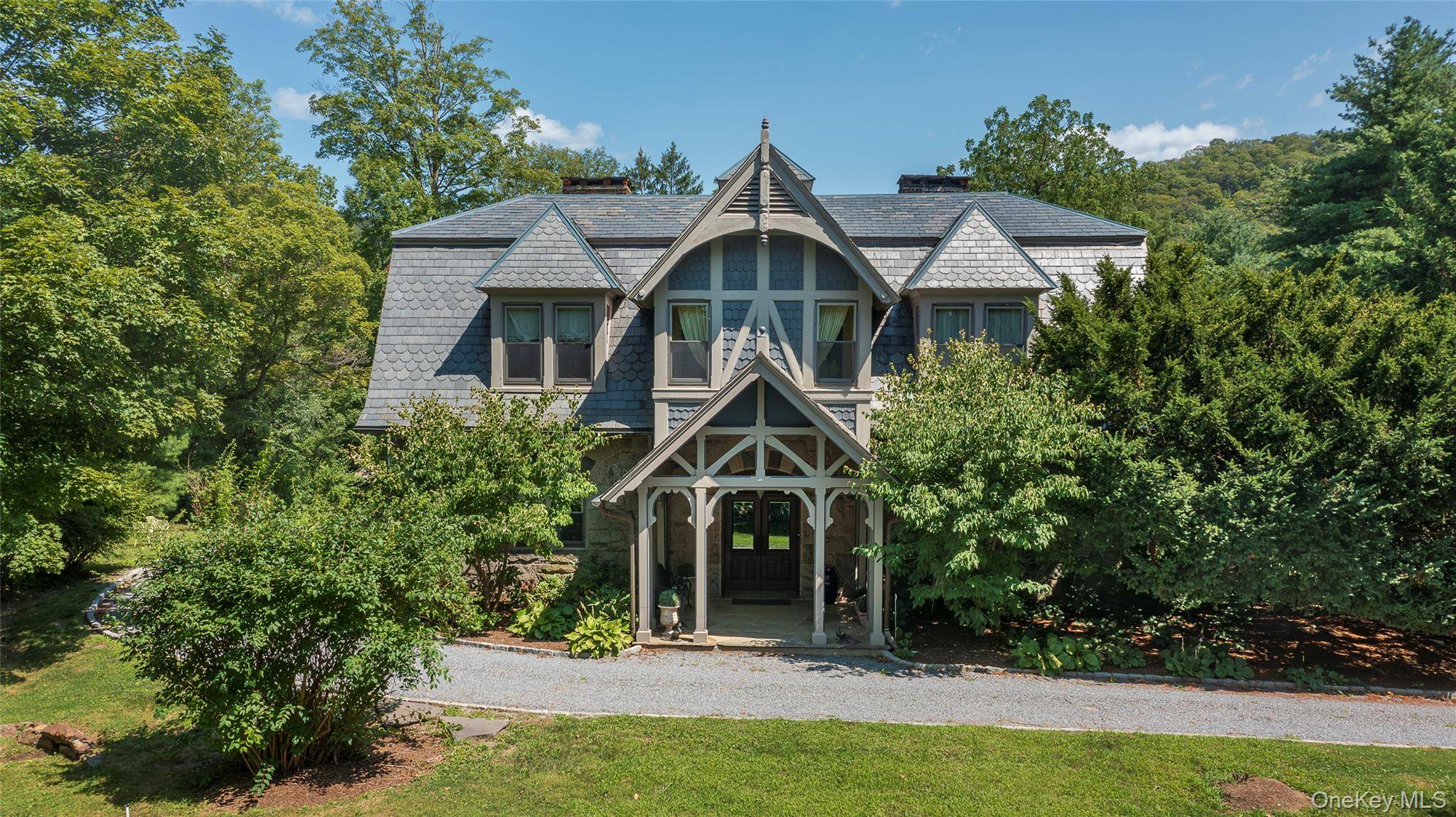 Step into a living legacy at The Birches a timeless masterpiece nestled in the heart of Garrison.