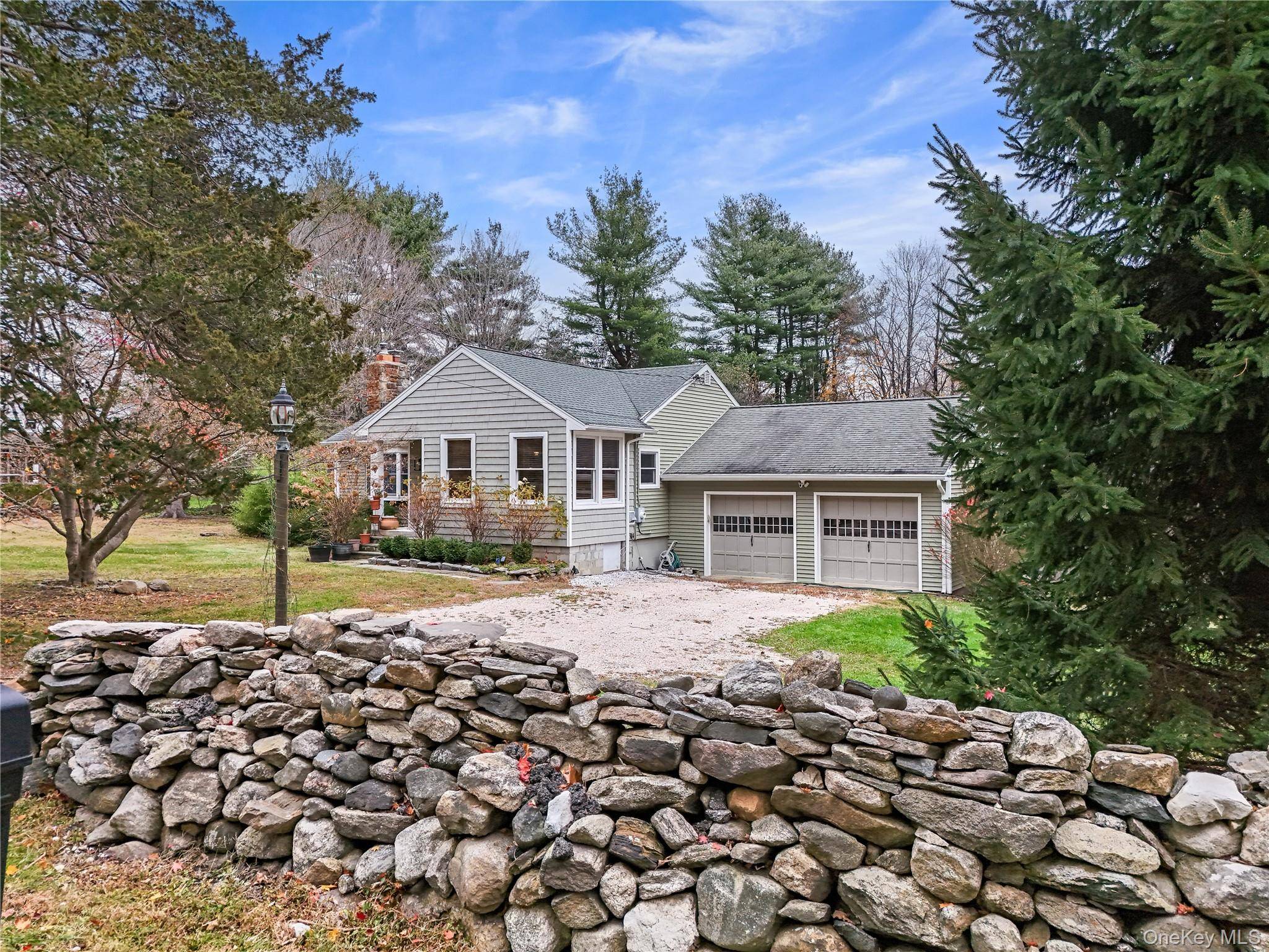 Discover this charming South Salem farmhouse nestled on two beautiful acres.