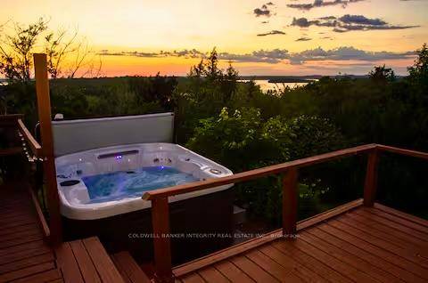 Welcome to Sunset Home a rare 4 season home with direct land access to beautiful Rice Lake !