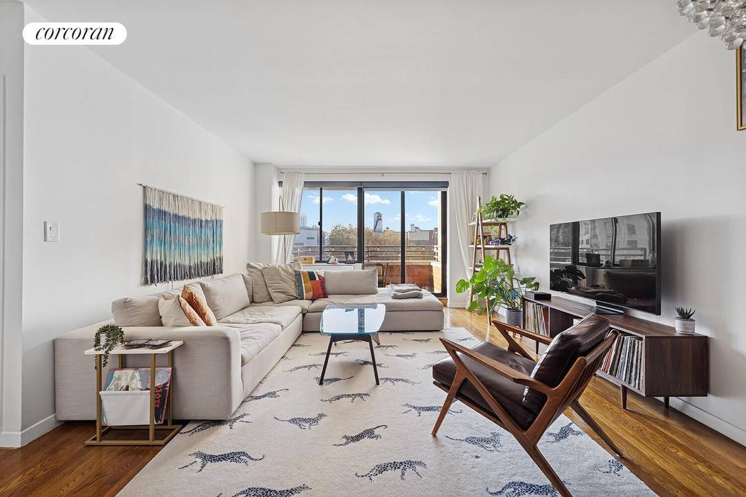 Bright and Airy One Bedroom with Private Outdoor Space in a Boutique Chelsea Condo Building Apartment Features Open and versatile living space with ample room for seating, dining, and more ...