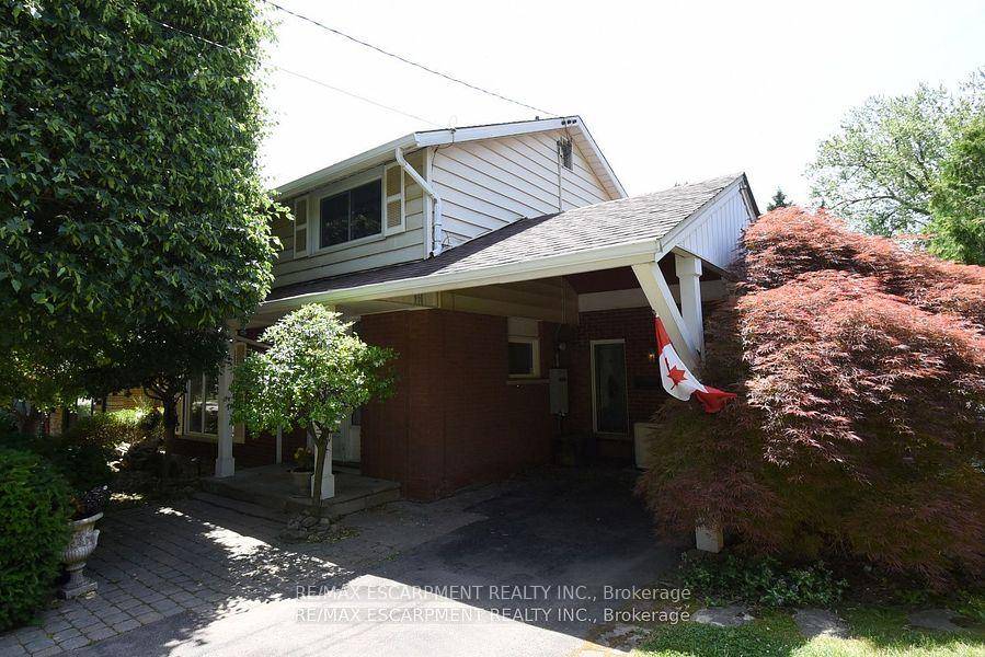 Exceptional and unique family home nestles in a quiet corner of the Westcliffe neighbourhood on the west Hamilton mountain.