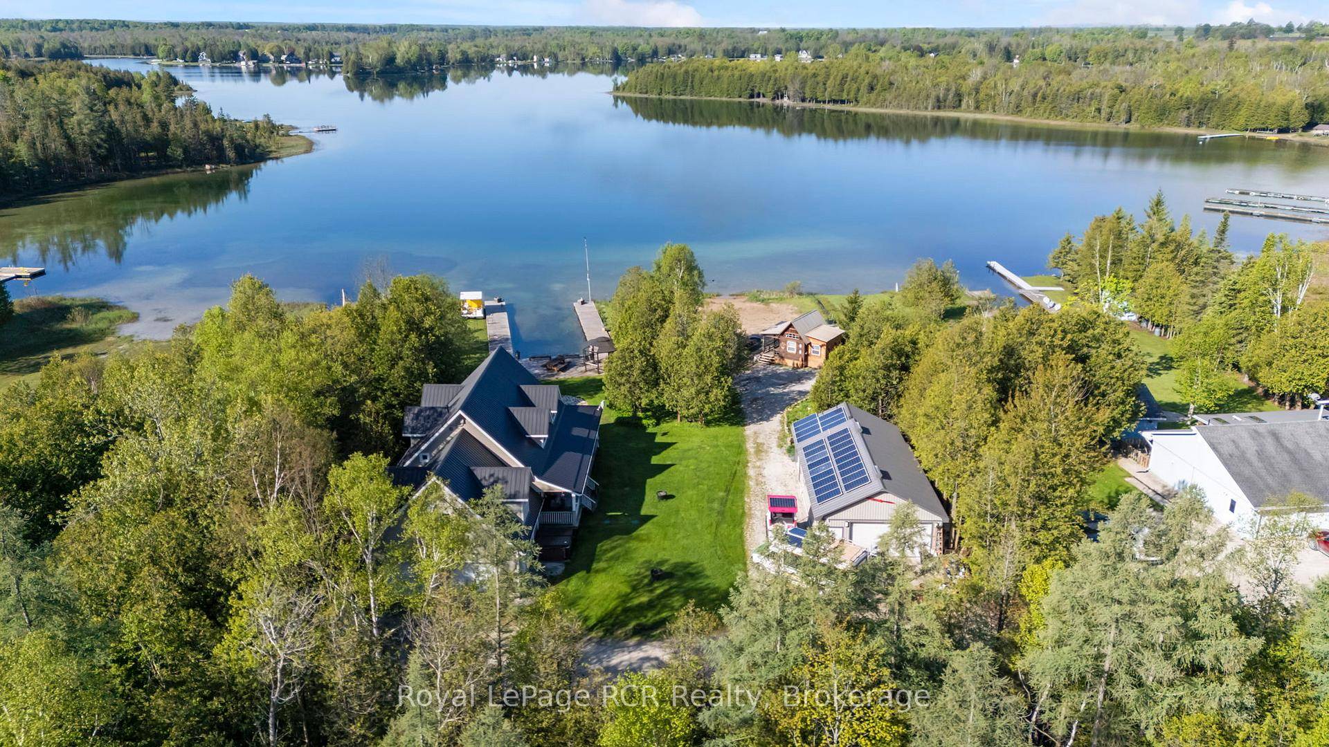 Within the aqua coloured waters of Williams Lake on over a half acre lot, this exceptional lakefront property presents a true paradise for those seeking waterfront living.