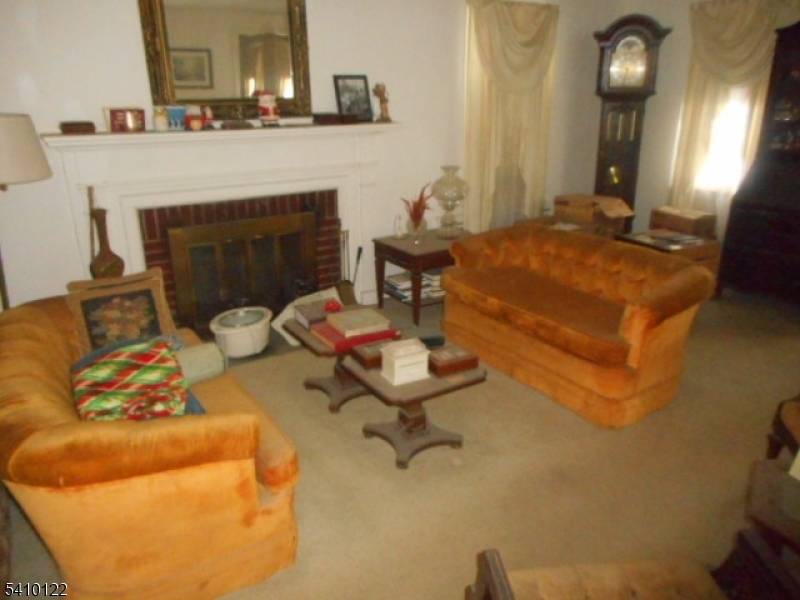 Welcome to 52 E. Sumner Ave, a delightful home situated on a desirable corner lot in the heart of Roselle Park.