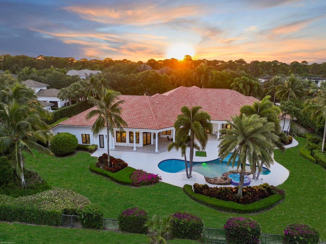 Experience the pinnacle of luxury living in this magnificent estate home nestled within one of Palm Beach Gardens' most exclusive golf communities Old Palm Golf Club.