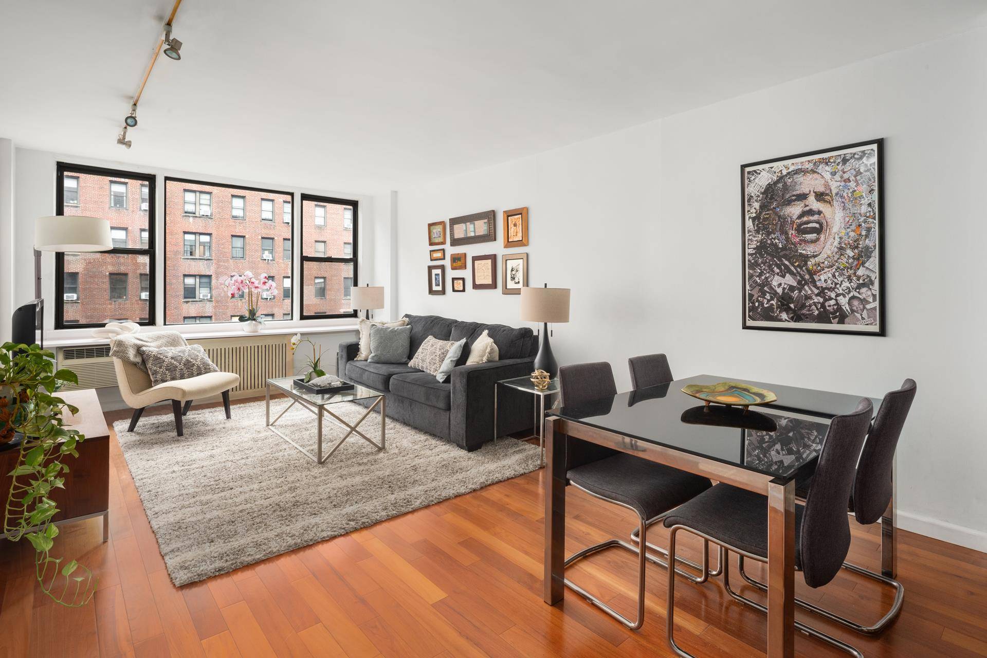 This renovated, sun filled and bright all day one bedroom one bathroom home with open city views resides at The Gloucester, a full service luxury cooperative located in the heart ...
