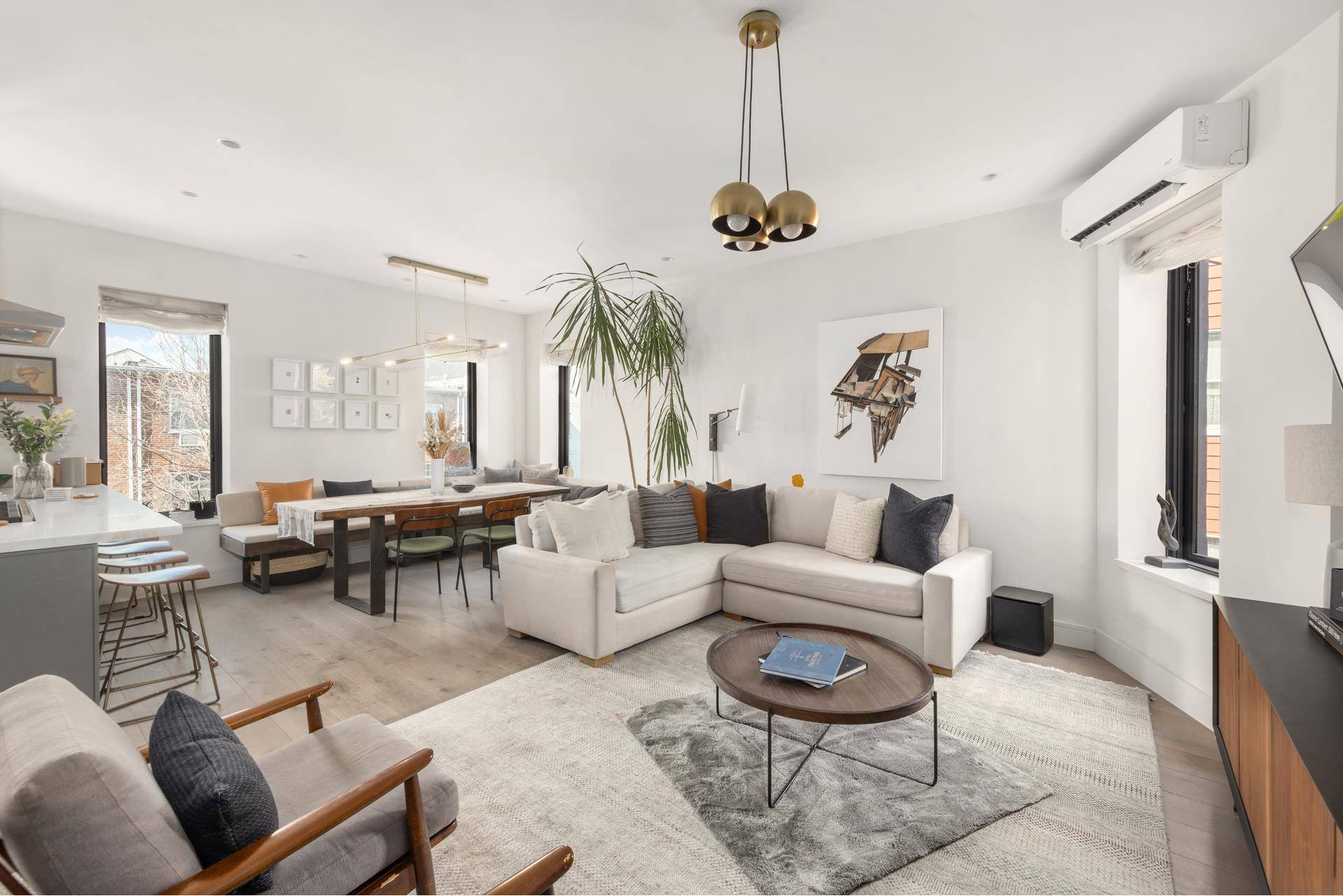 47 Orient Avenue is a meticulously renovated two family townhouse tucked away on a quiet, tree lined street in prime East Williamsburg.