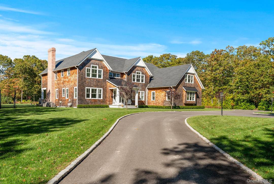 Welcome to this recently built custom home nestled in the charming Village of Quogue.