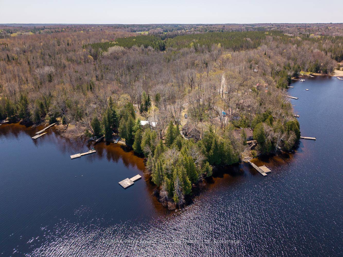 4 season three bedroom and one bathroom on a year round road situated on a gorgeous point of land.