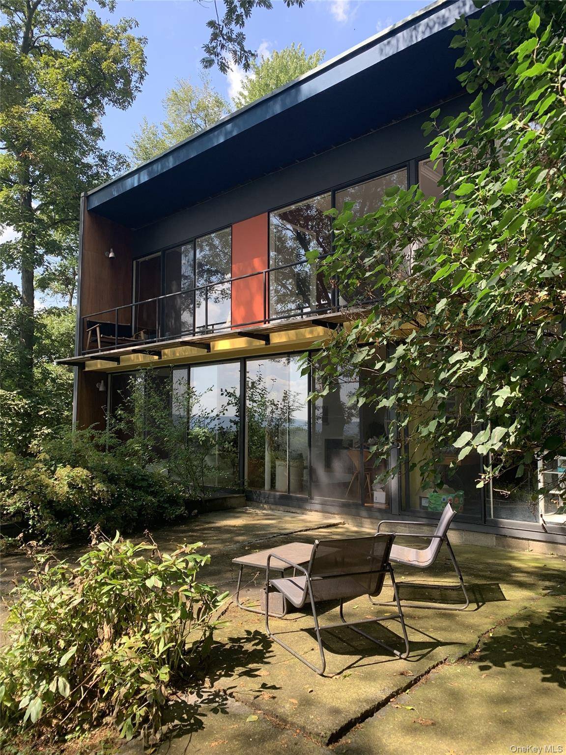 HUDSON RIVER VIEWS MID CENTURY MODERN GEM PRIVATE WOODED ACRE Less than an hour from Manhattan, this stunning restored mid century modern glass house sits on 1 private acre with ...