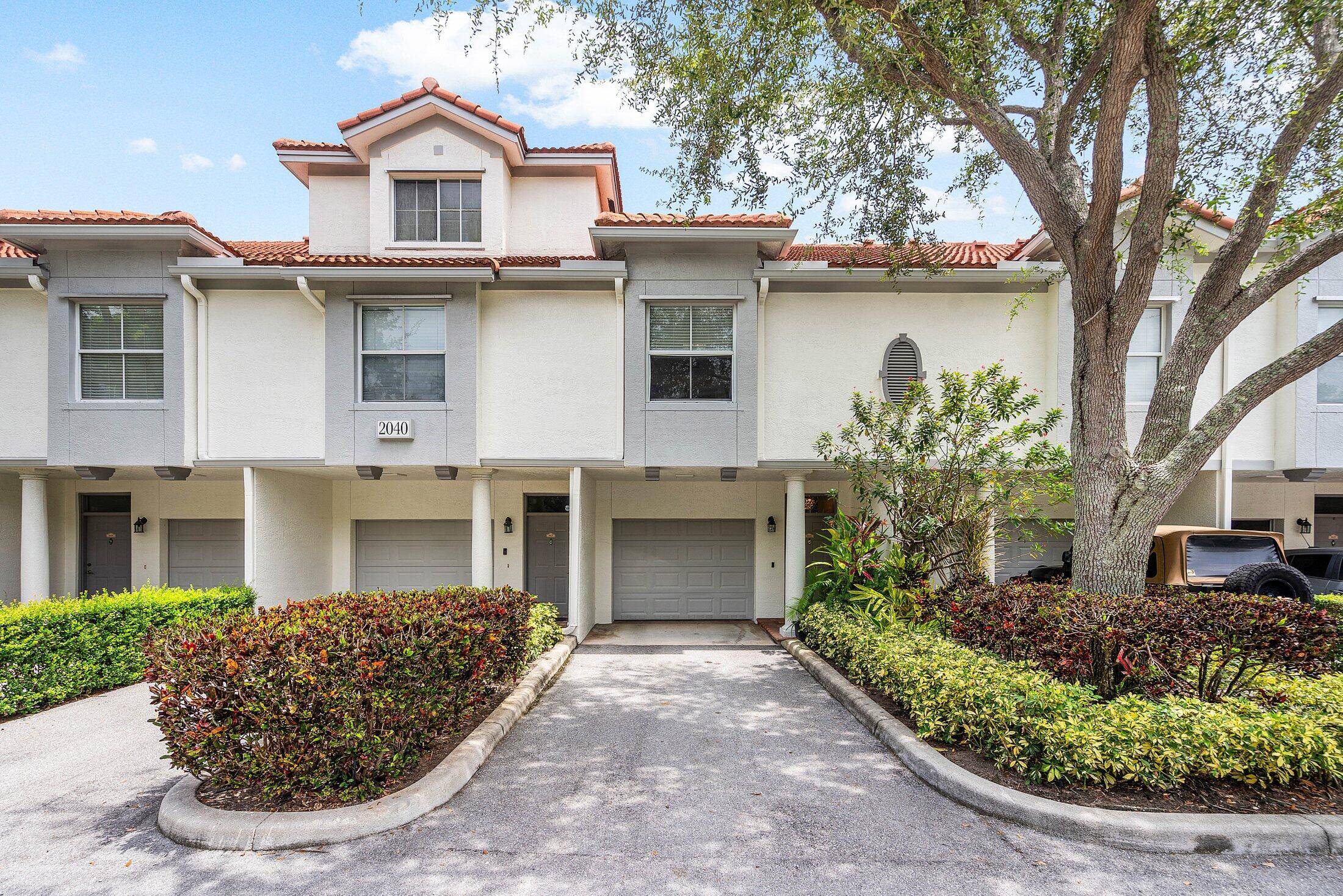 The best East Delray location offers a 3 floor Townhouse with direct lake views.