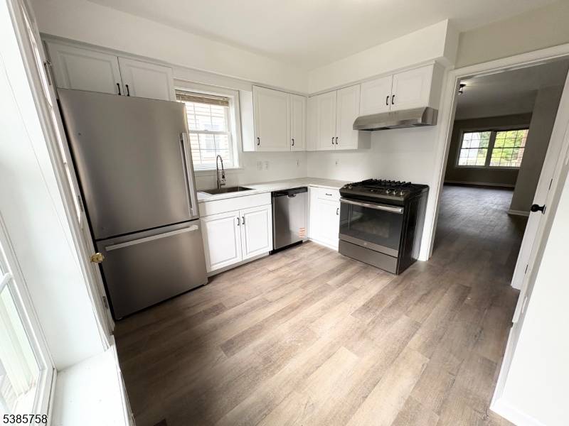 Newer built side by side two family property located in the heart of Madison's downtown and steps to the park, shopping and NYC Trains.