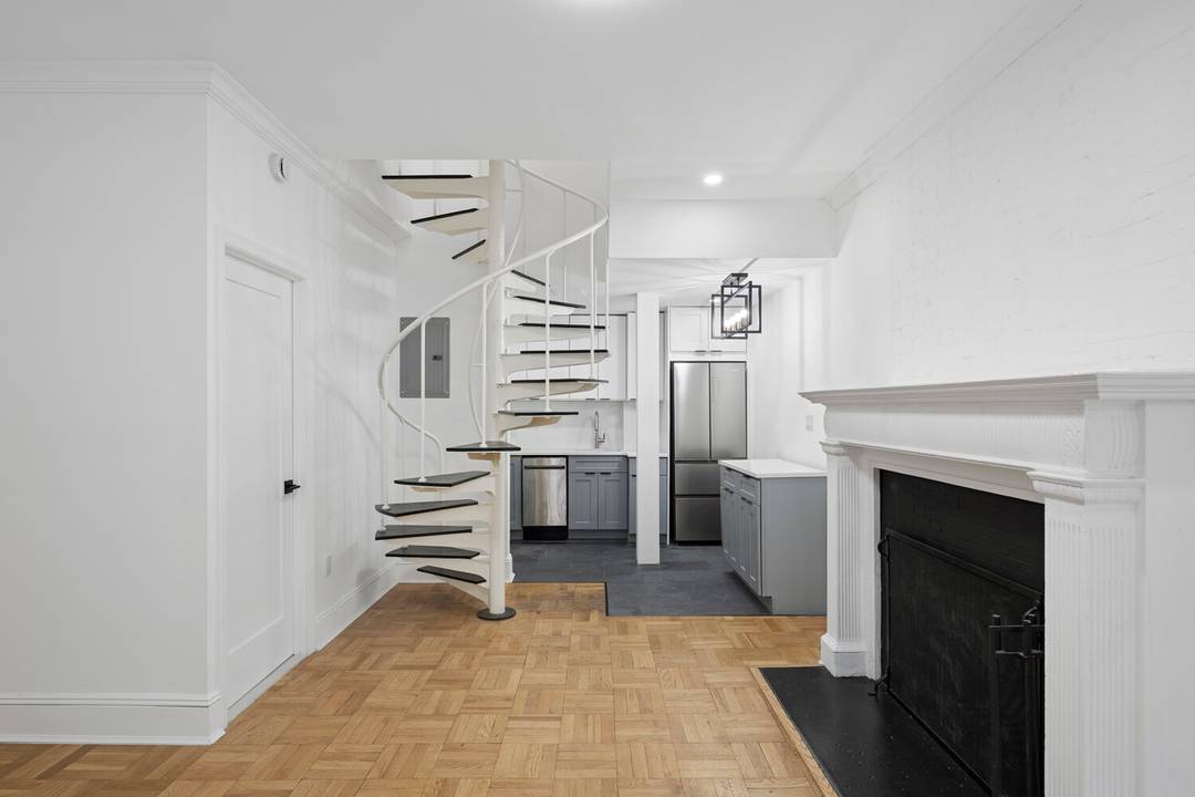 Renovated brownstone duplex one bedroom with 1.