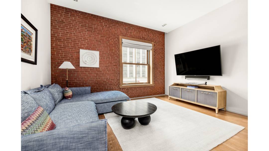 Located in the landmarked Cary Building, this 1, 617 square foot, 2 bedroom, 3 bath residence pairs authentic prewar architecture with clean, contemporary design.