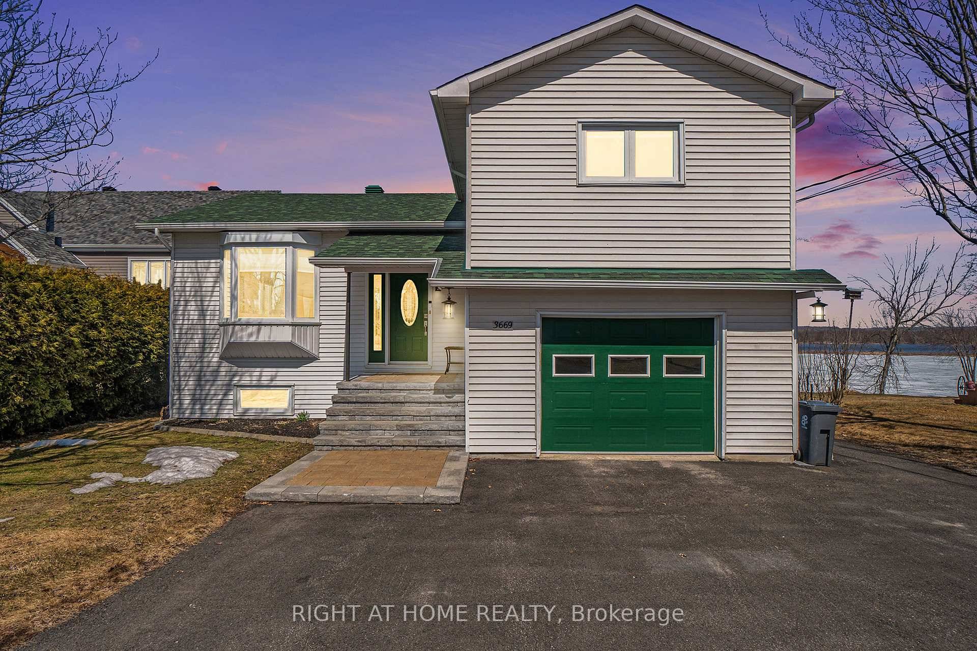 Welcome to 3669 Principale, a one of a kind 5 bedroom, 2 bath waterfront masterpiece that blends modern elegance with serene, resort style living.
