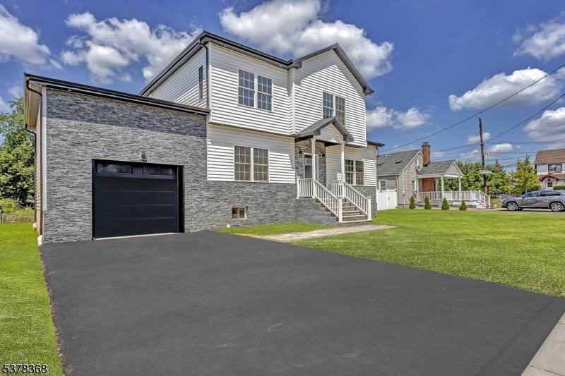 Welcome to this beautiful new construction home by RKS Homes, where modern luxury meets timeless comfort.