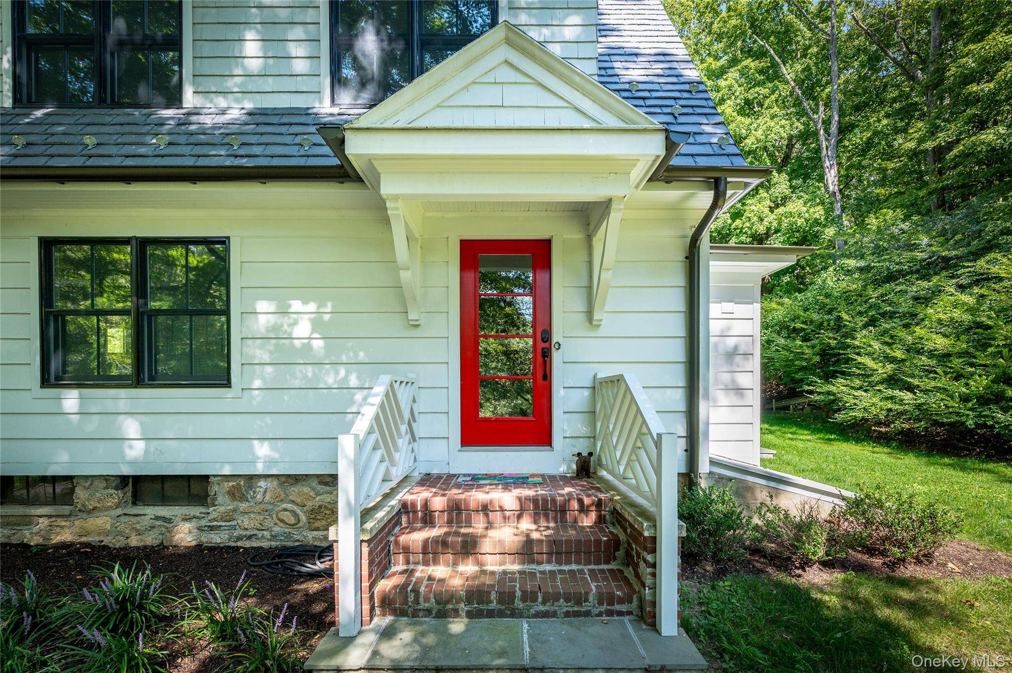 Beautiful, completely redone colonial with character and charm on over 2 private acres on a picturesque country road with a large living room with wood burning fireplace, a sun room ...