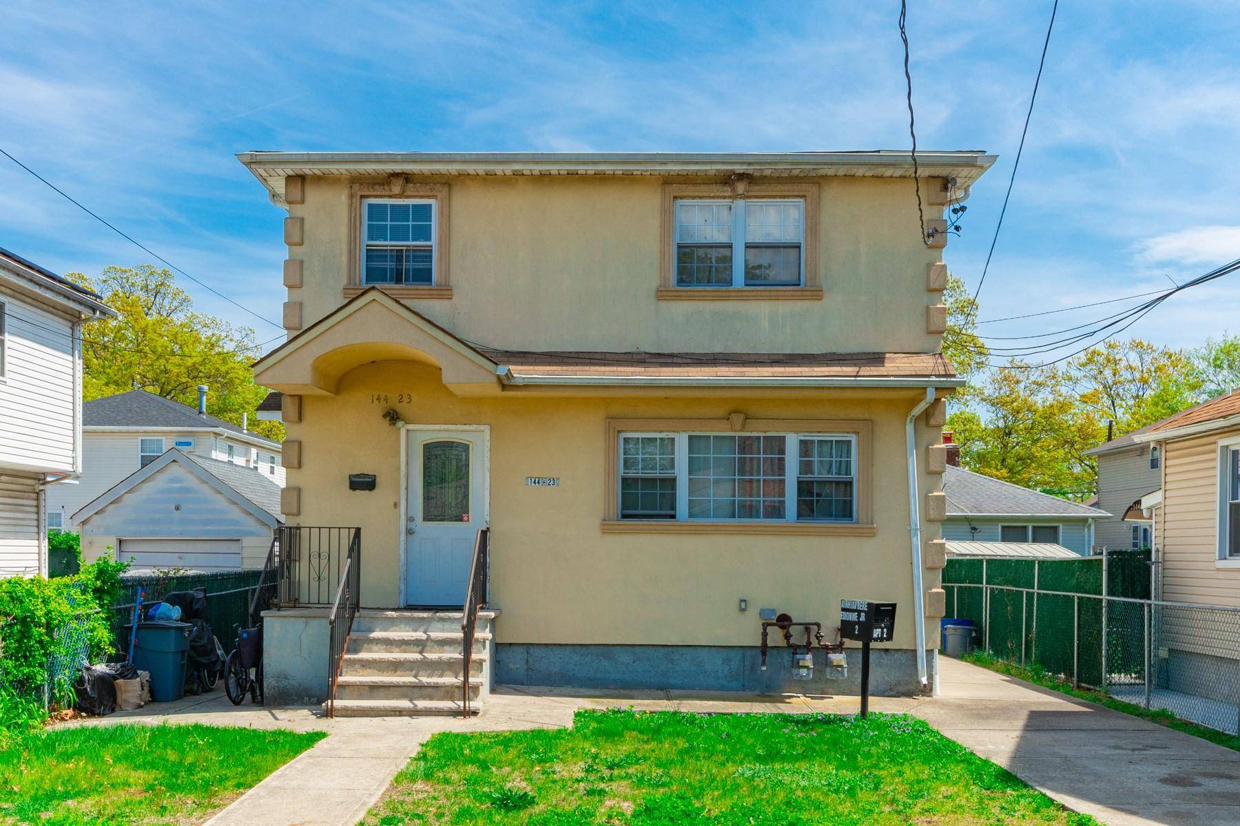 Welcome to 144 23 231st Street, a spacious and versatile legal 2 family home located on a quiet, tree lined block in Springfield Gardens, Queens.