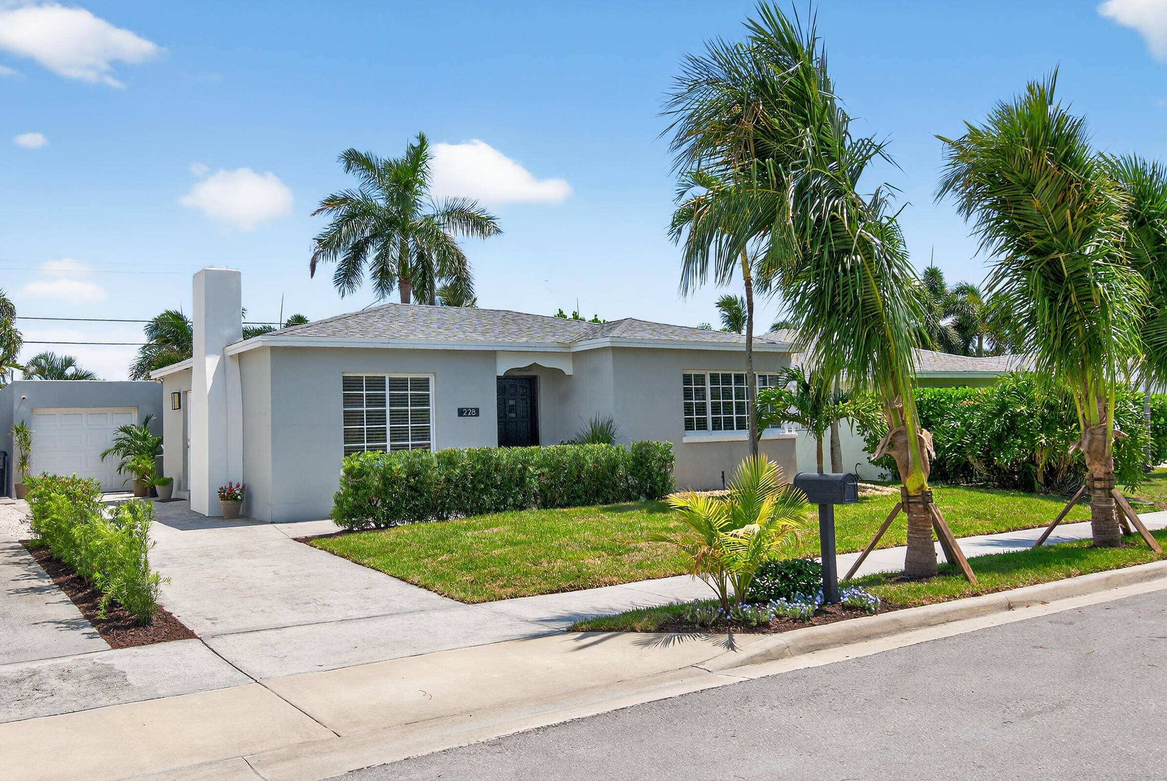Welcome to this beautifully remodeled single family home, nestled in the vibrant College Park neighborhood of Lake Worth Beach.