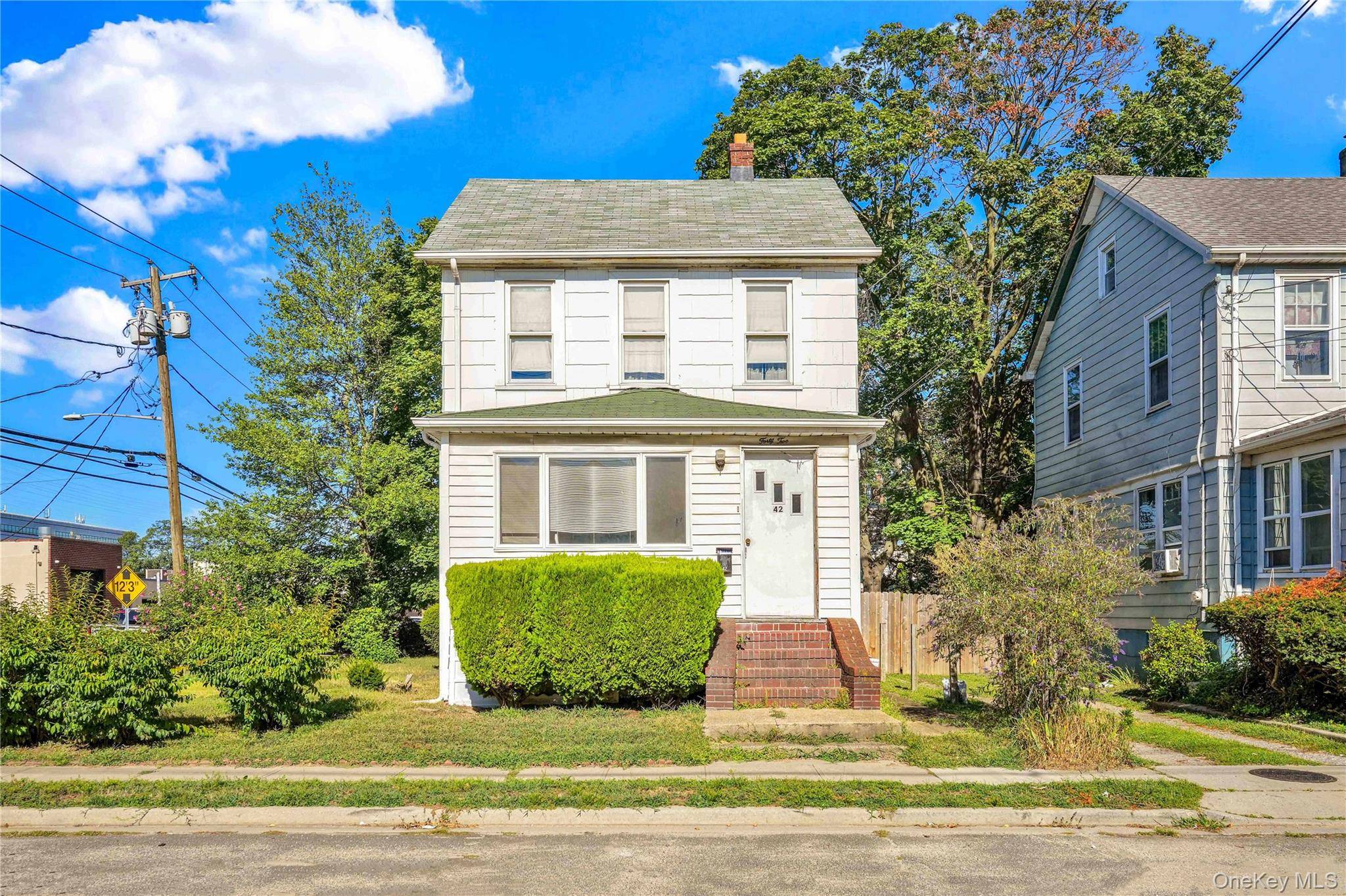 Welcome to 42 Satterie Avenue, a charming detached one family home located on a desirable corner property in Valley Stream.