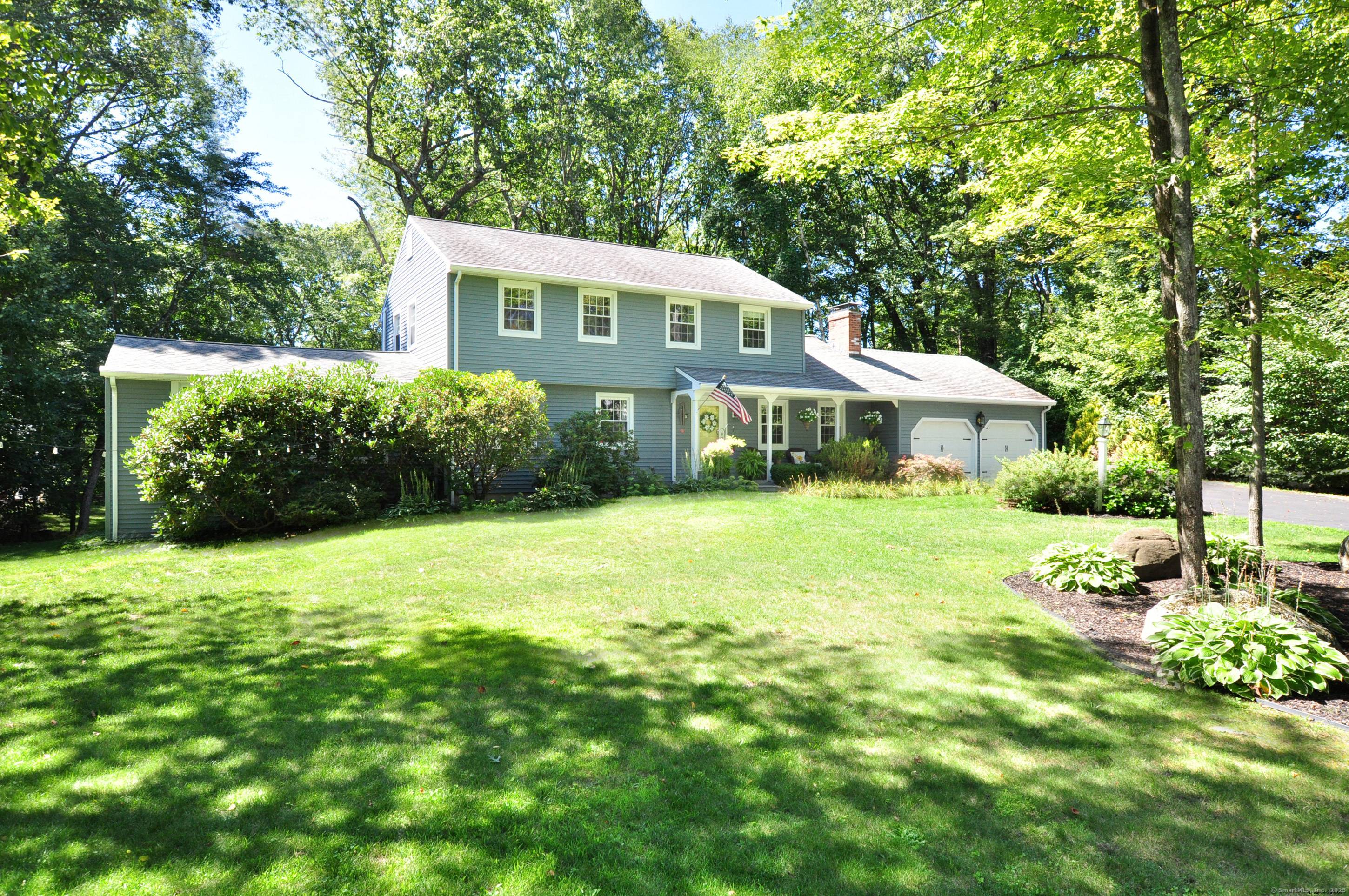 Stunning Colonial with Timeless Curb Appeal.