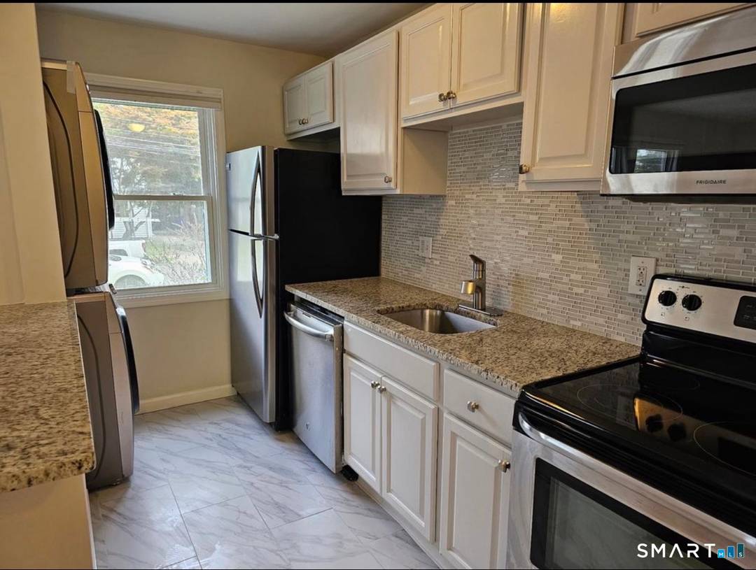 Turnkey, side by side multifamily opportunity in one of West Hartford's most desirable residential pockets, ideal for both investors and owner occupants seeking strong income potential with flexible living arrangements.