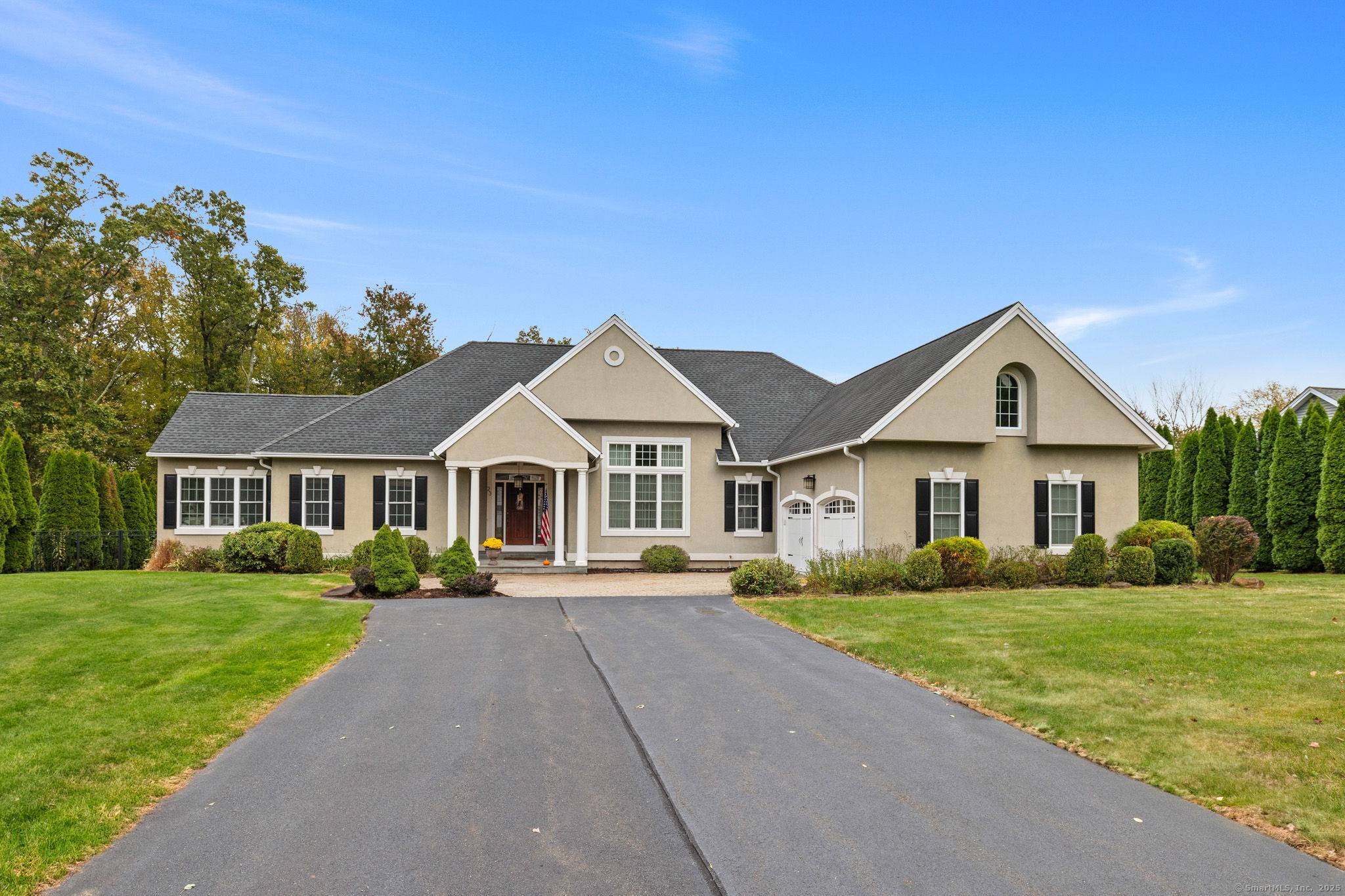 Discover seamless single level luxury in this impeccably maintained Tunxis Heights home.