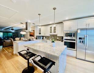 Updated Corner Villa in Gated 55 Boca Lakes Prime Boca Raton Location with Resort Amenities !