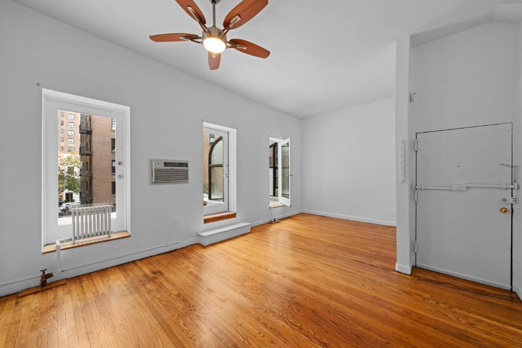 Spacious Chelsea Studio with Solarium, Fireplace amp ; Roof spaceBeautiful, unique studio owned and loved for 17 years, now on the market !