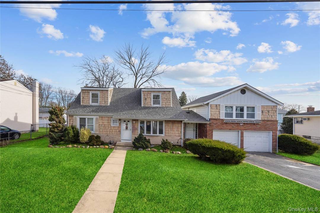 ALL utilities included ! 6 Bedroom, 2 bathroom house with 2 car garage, driveway, backyard.