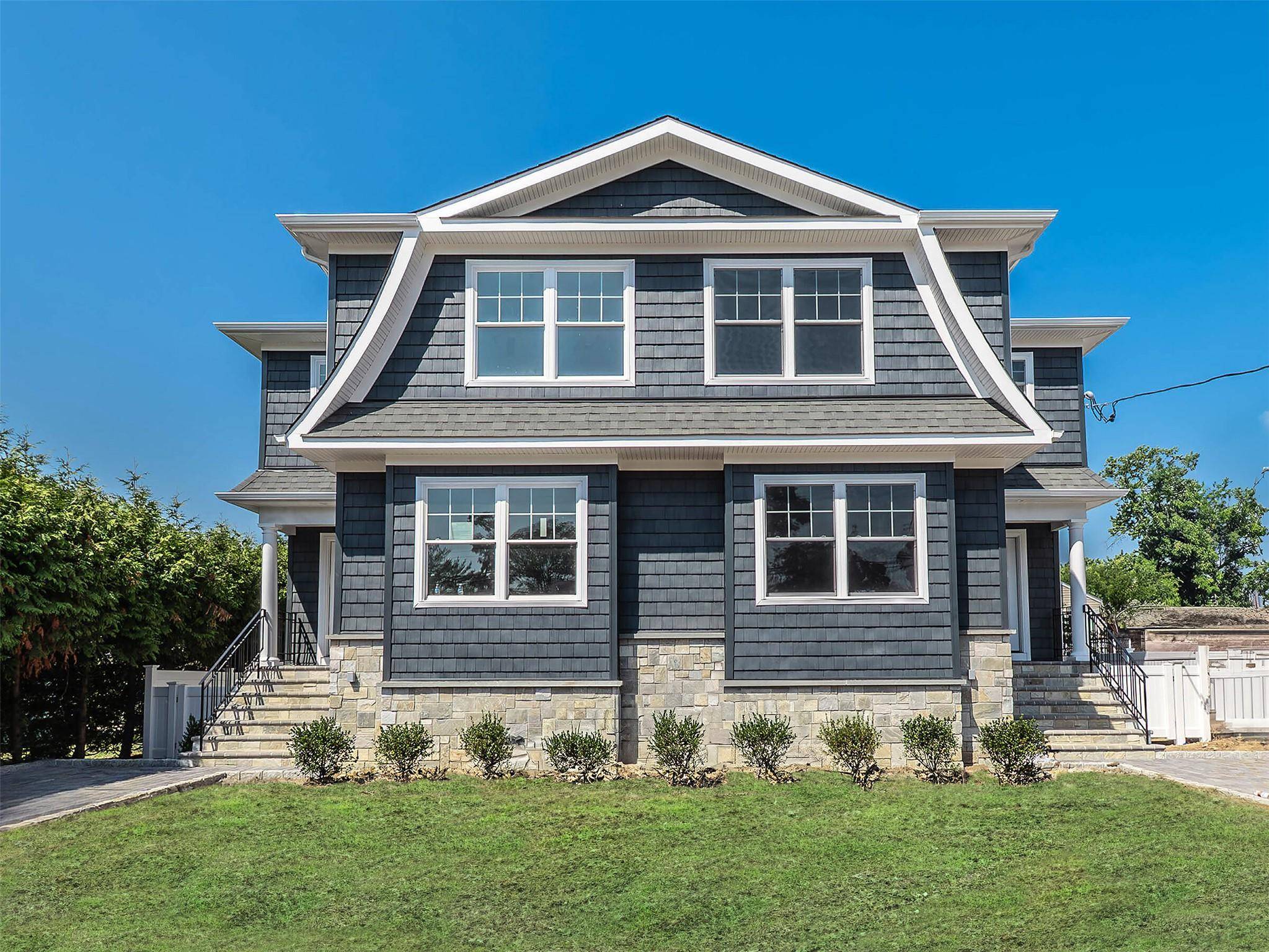New Construction Duplex with living room, dining area, modern kitchen amp ; powder room on the main level.