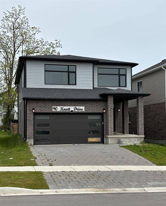 South London two storey home featuring 4 bedrooms, 3 bathrooms, and a double car garage.
