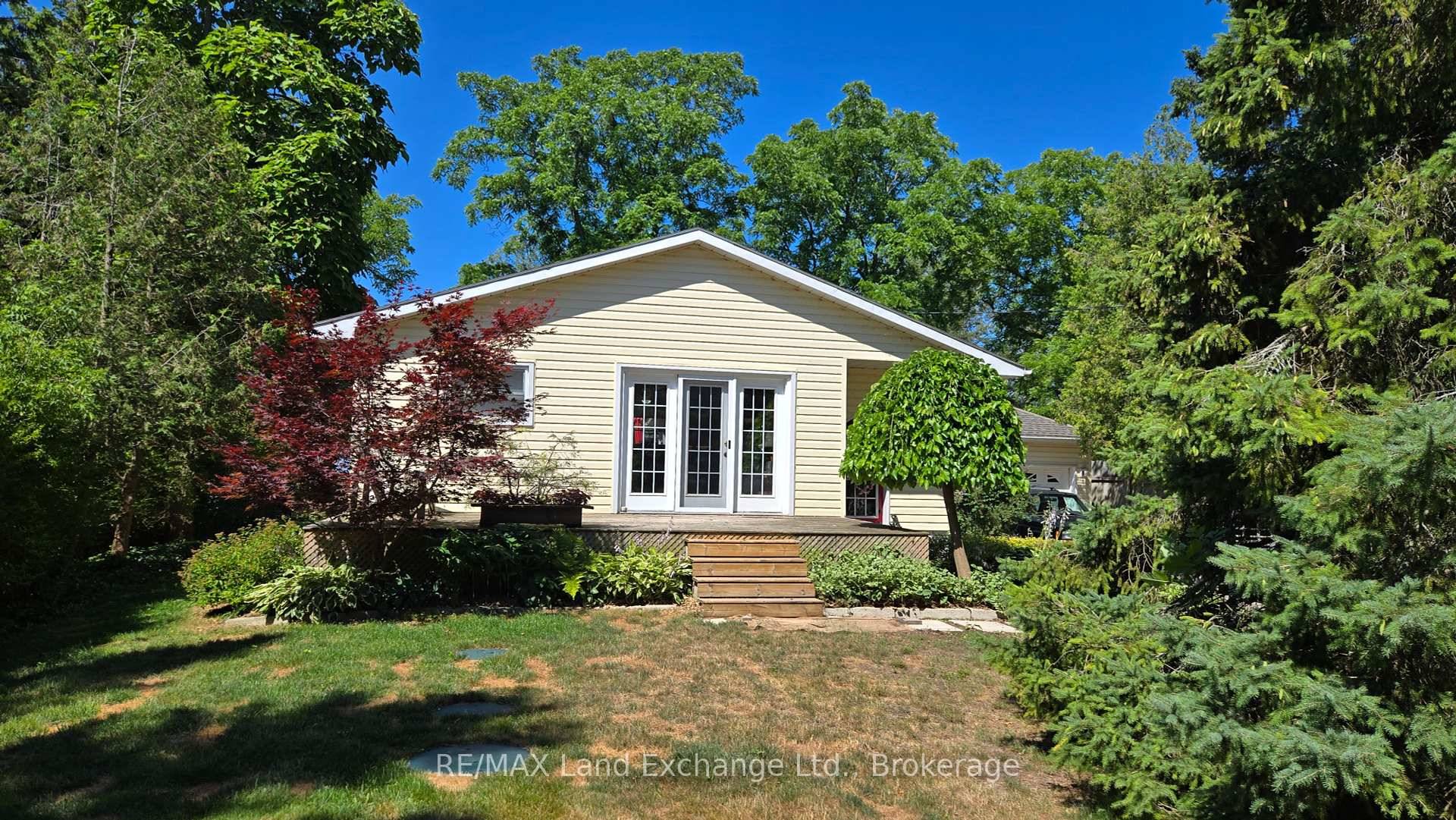 Perfect retirement home that features partial lake view with close proximity to the shores of Lake Huron.
