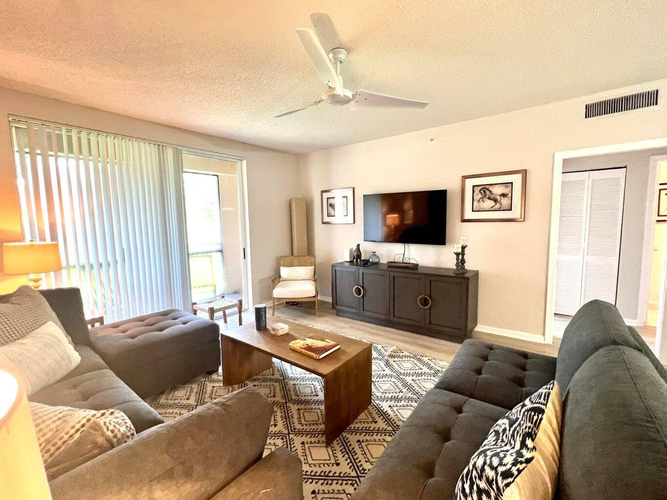 Beautifully renovated 2 bedroom, 2 bathroom residence in the sought after Saint Andrews at the Polo Club, one of Wellington's premier communities.