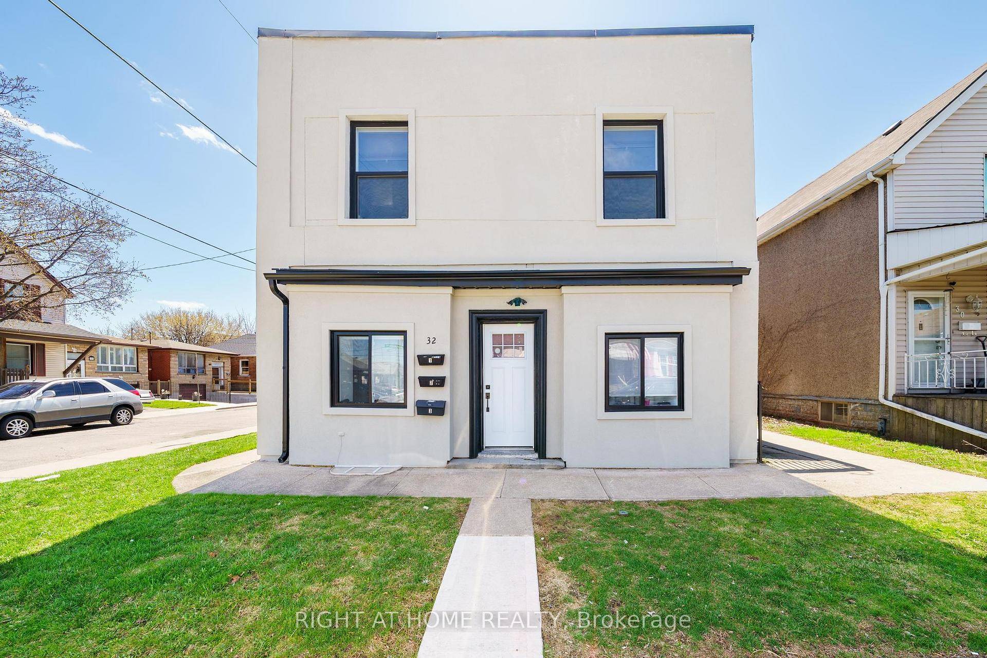Welcome to 32 Britannia Avenue, a fully renovated 2021 triplex steps from trendy Ottawa Street in Hamilton.