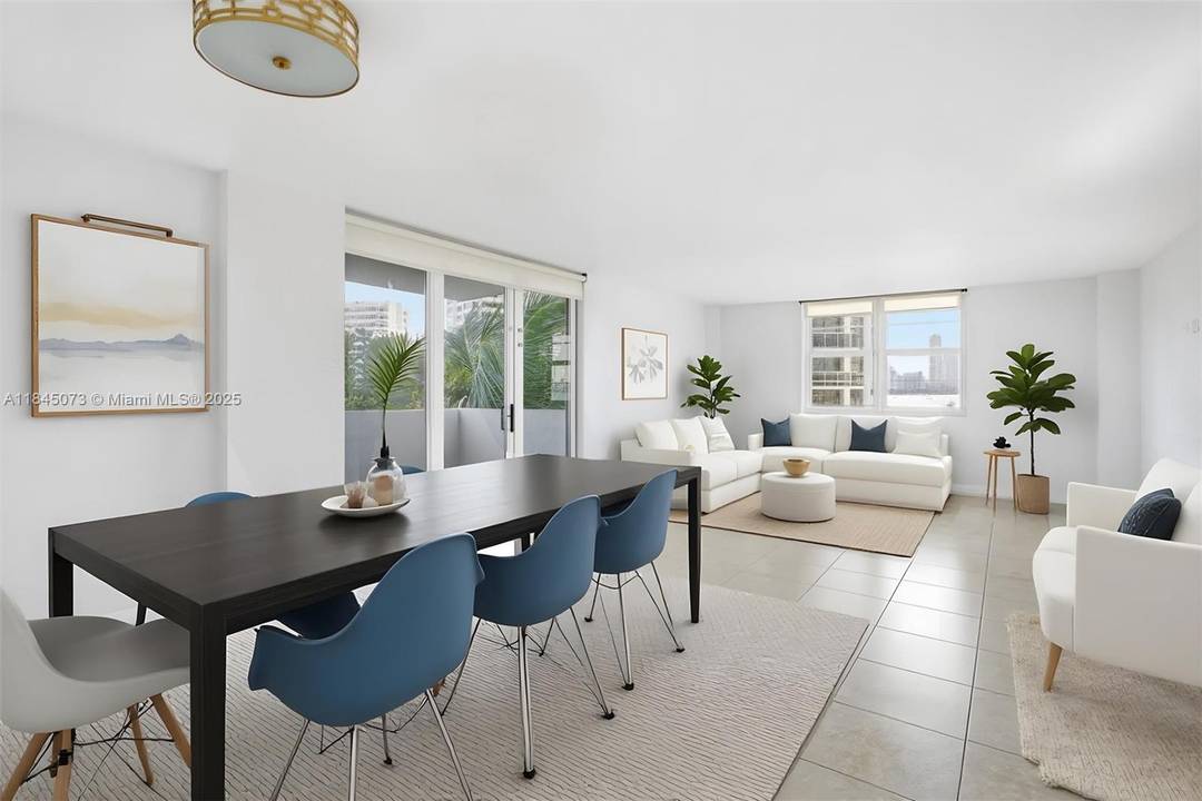 Stunning corner residence at Island Terrace with sweeping south and east views of Biscayne Bay and Belle Isle.