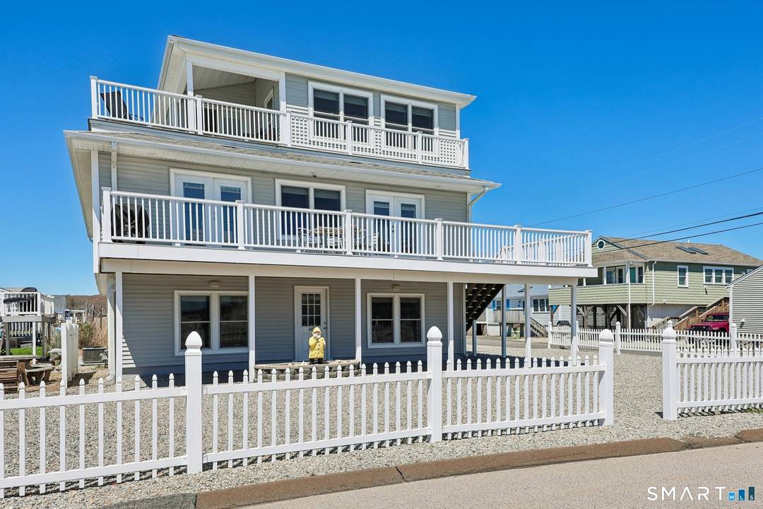 Exceptional year round coastal retreat set on a rare double lot on coveted Seaside Avenue, one of Westbrook's most sought after shoreline locations.